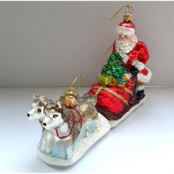Weihnachtskugel Santa mit seinem Hundeschlitten